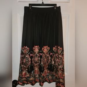Embroidered skirt.
